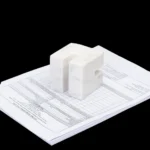 opulent homes white pearl cube shape paper weight