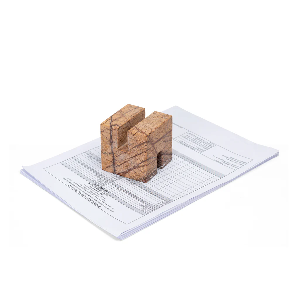 opulent homes brown bidasar cube shape paper weight