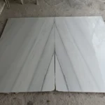 lassa white marble bookmatch slabs
