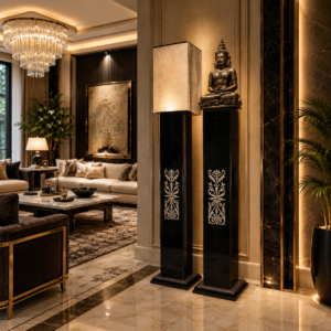 The Noir black marble tall pedestal lamp with white floral etching in luxury living room with Buddha statue