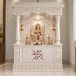 Luxury carved white marble home mandir with Durga idol and Shubh Swastik marble inlay on front panel