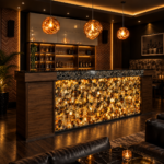 Natural backlit amber agate stone slab used as bar front panel for luxury home bar unit by Stone Plus India