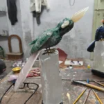 The Verdant Pinnacle - Green Aventurine Bird on White Quartz